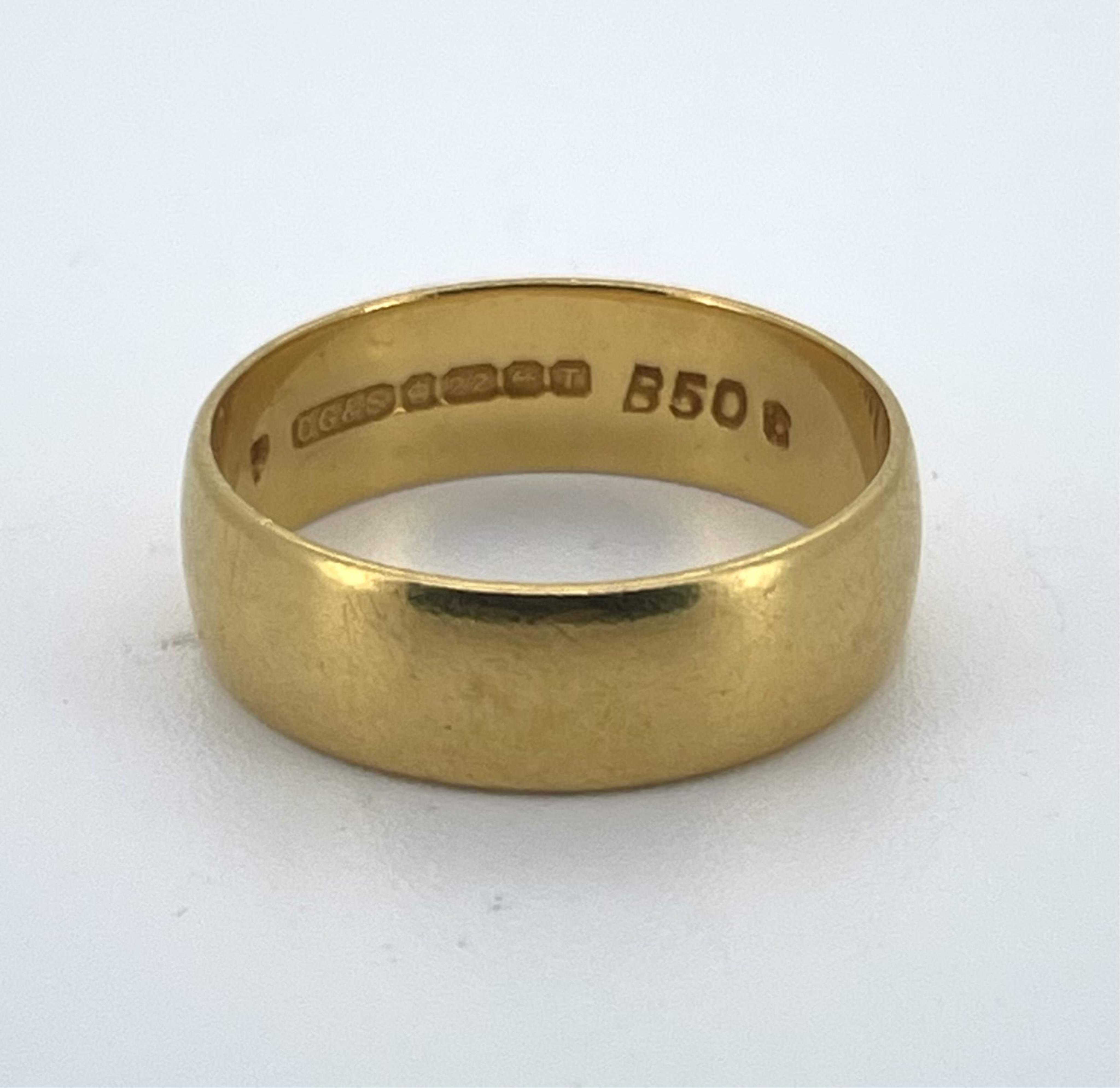A 22ct gold wedding band, size O1/2, 6mm width, British hallmarks, date letter for 1968, gross weight approximately 5.5 grams